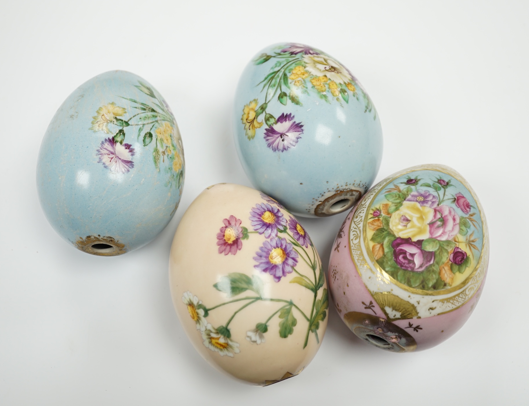 Four Russian porcelain Easter eggs, 19th century, 11cm high